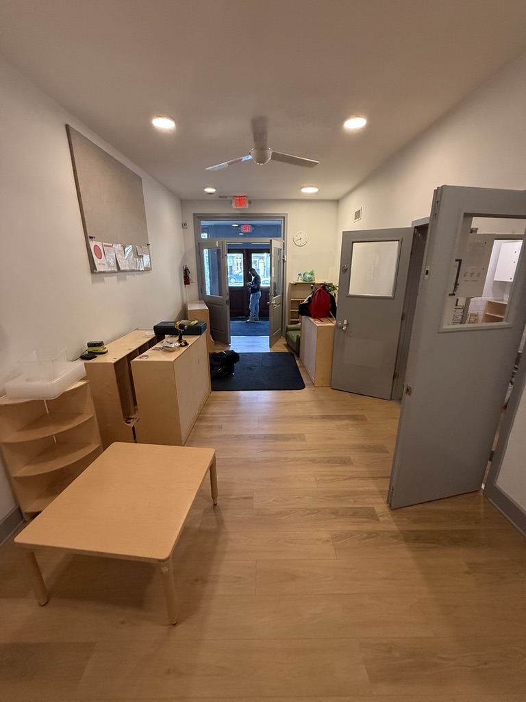 School room with new vinyl plank flooring and furniture