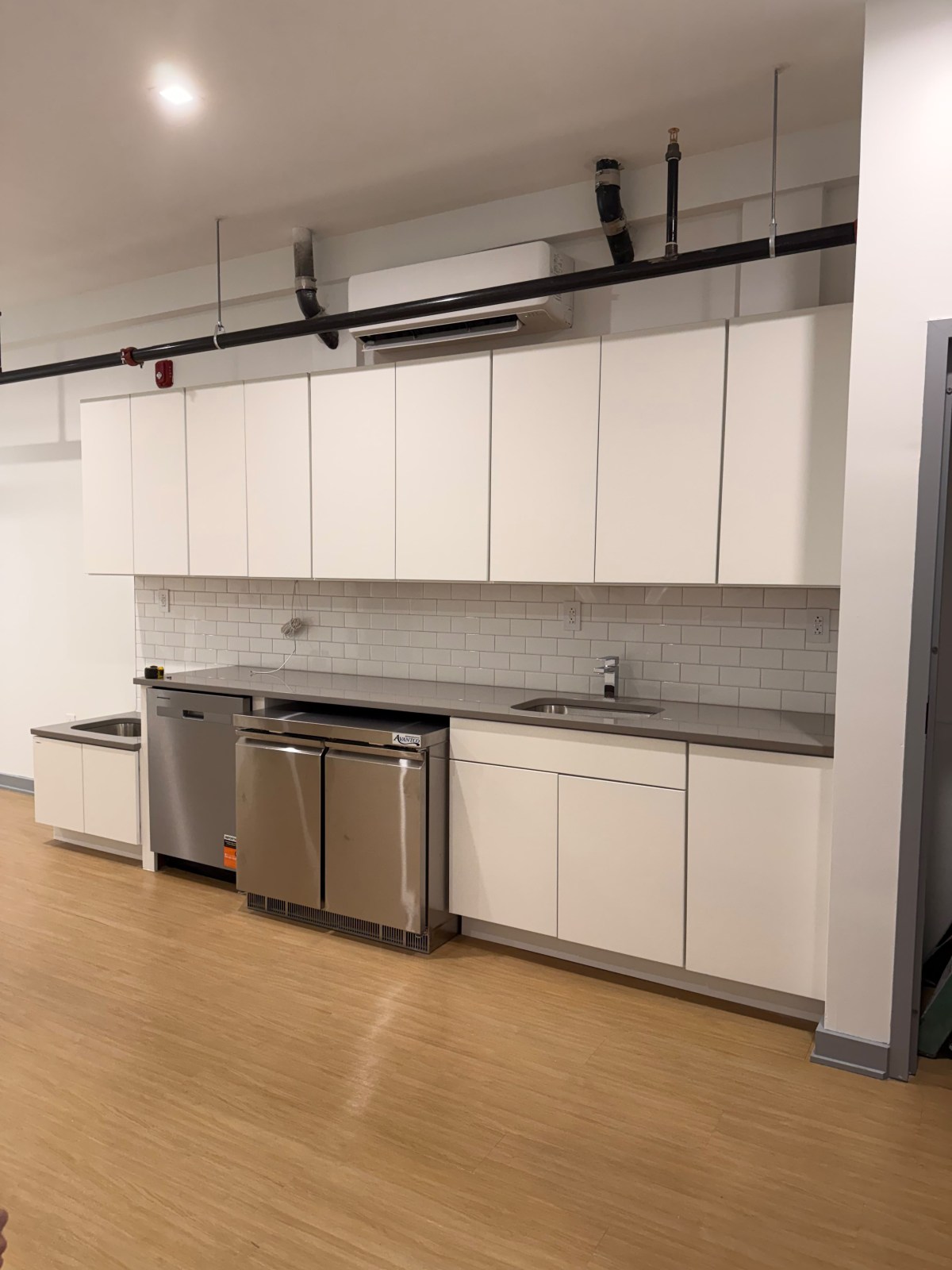 Kitchen with new wood-look vinyl flooring