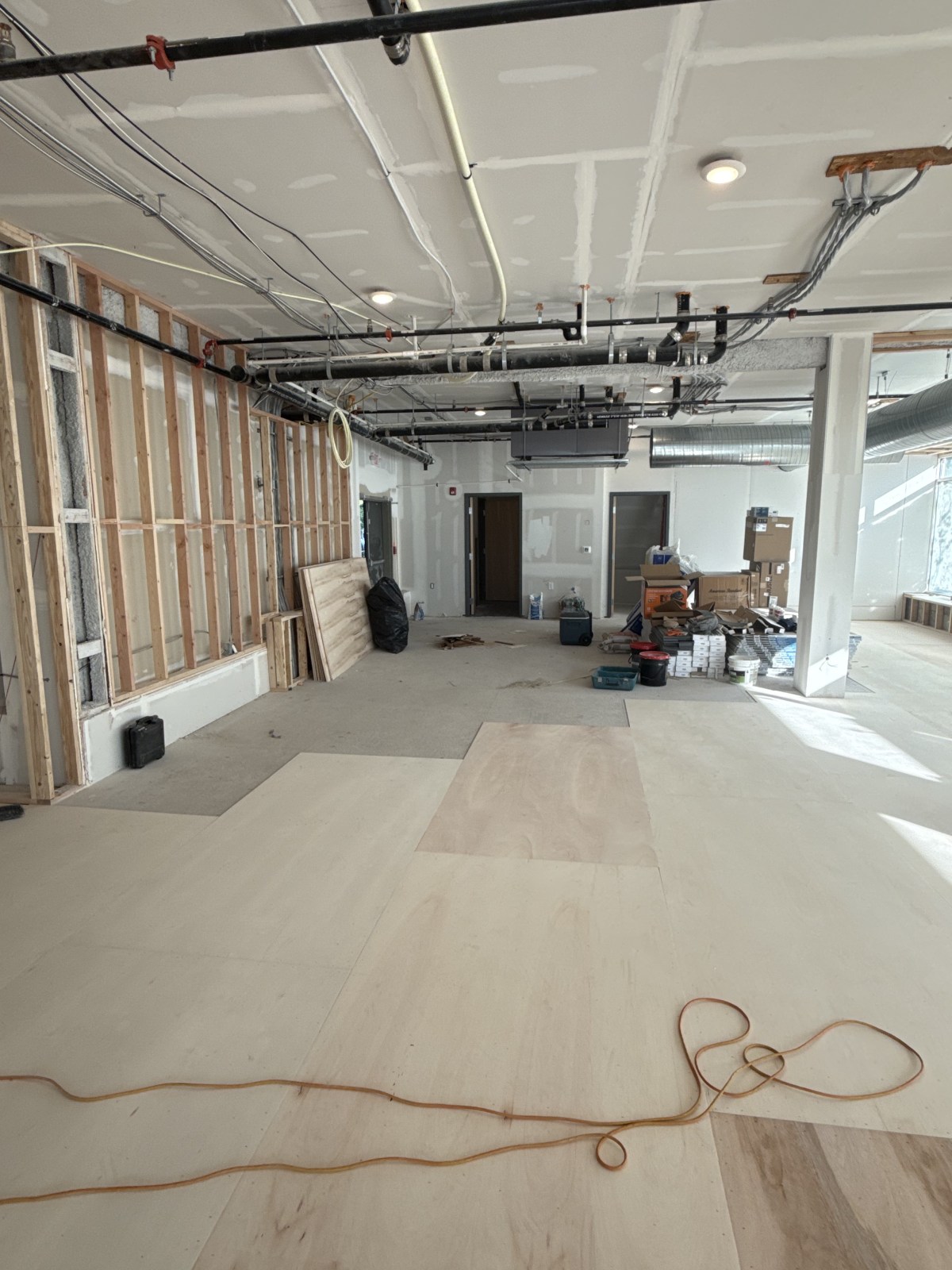 Lauan underlayment installed over existing subfloor
