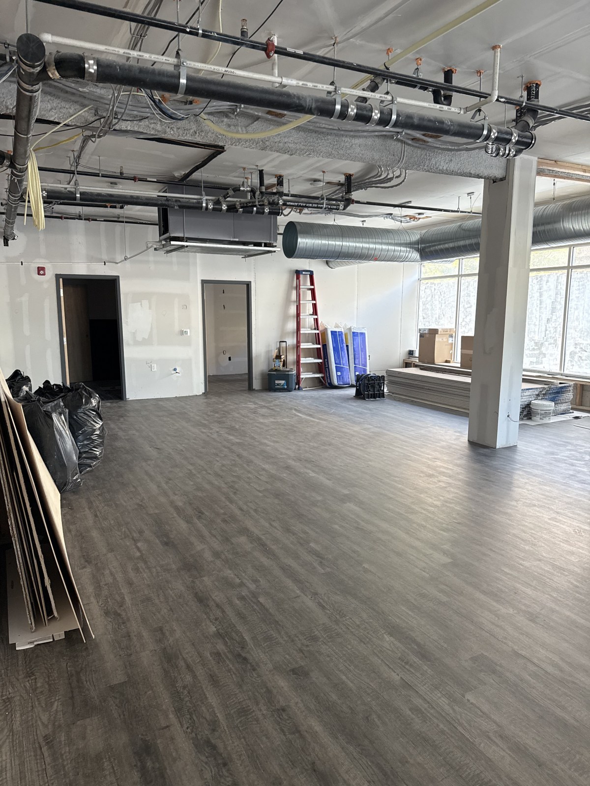 Retail store after luxury vinyl plank installation