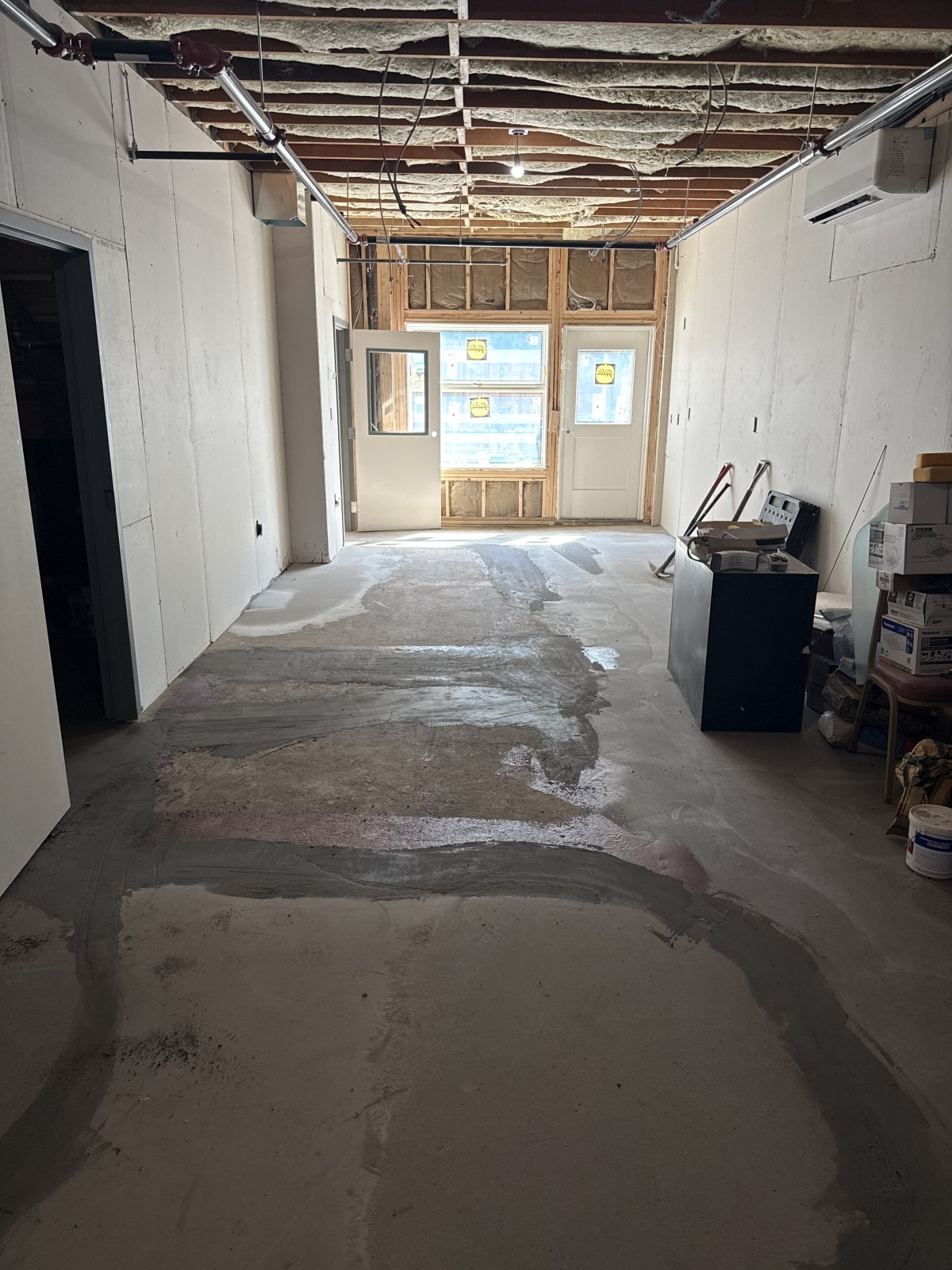 Concrete slab with patching before flooring installation