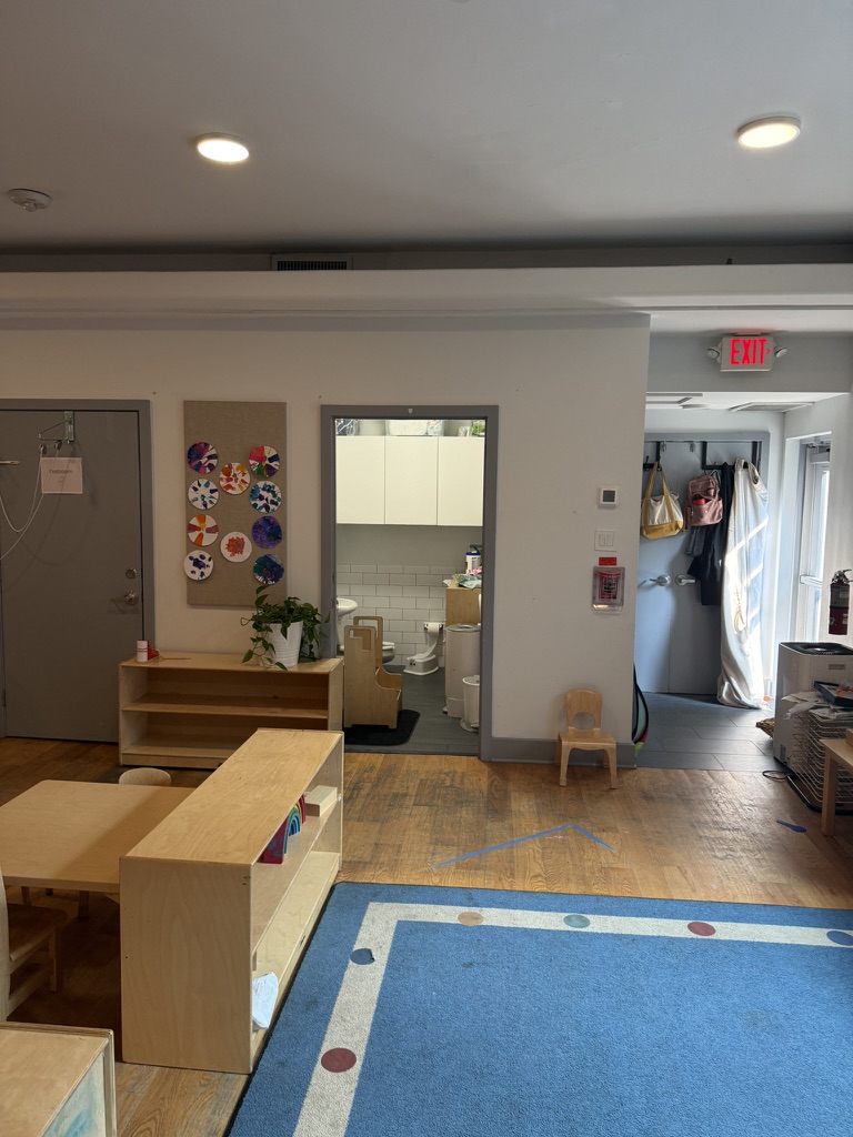 School classroom with existing hardwood floor before installation